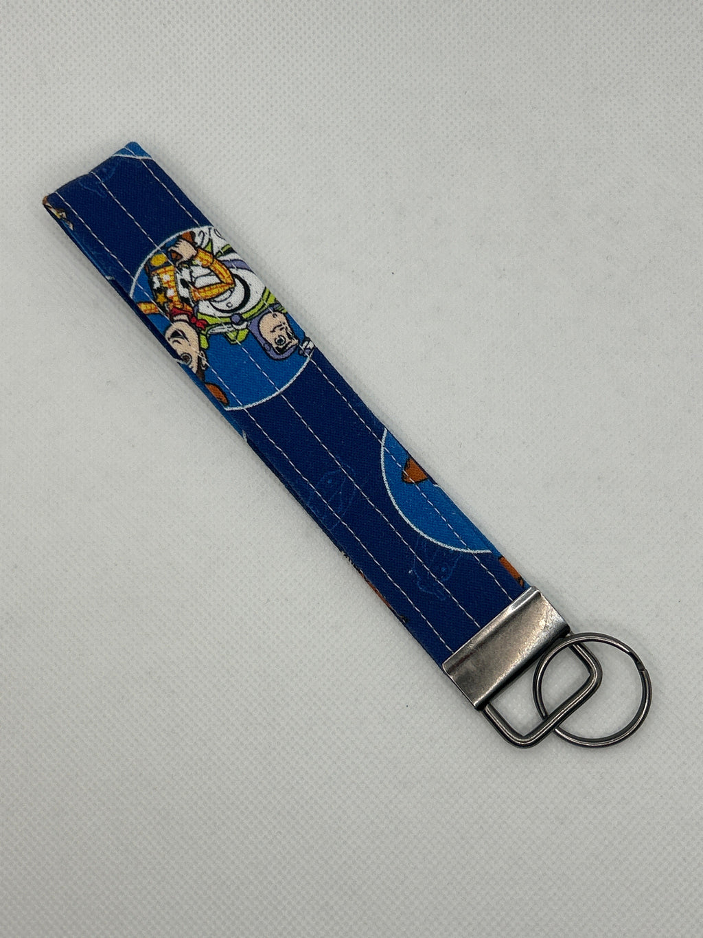 Your Favorite Animated Toy Movie Characters Key Fob Wristlet – Blue