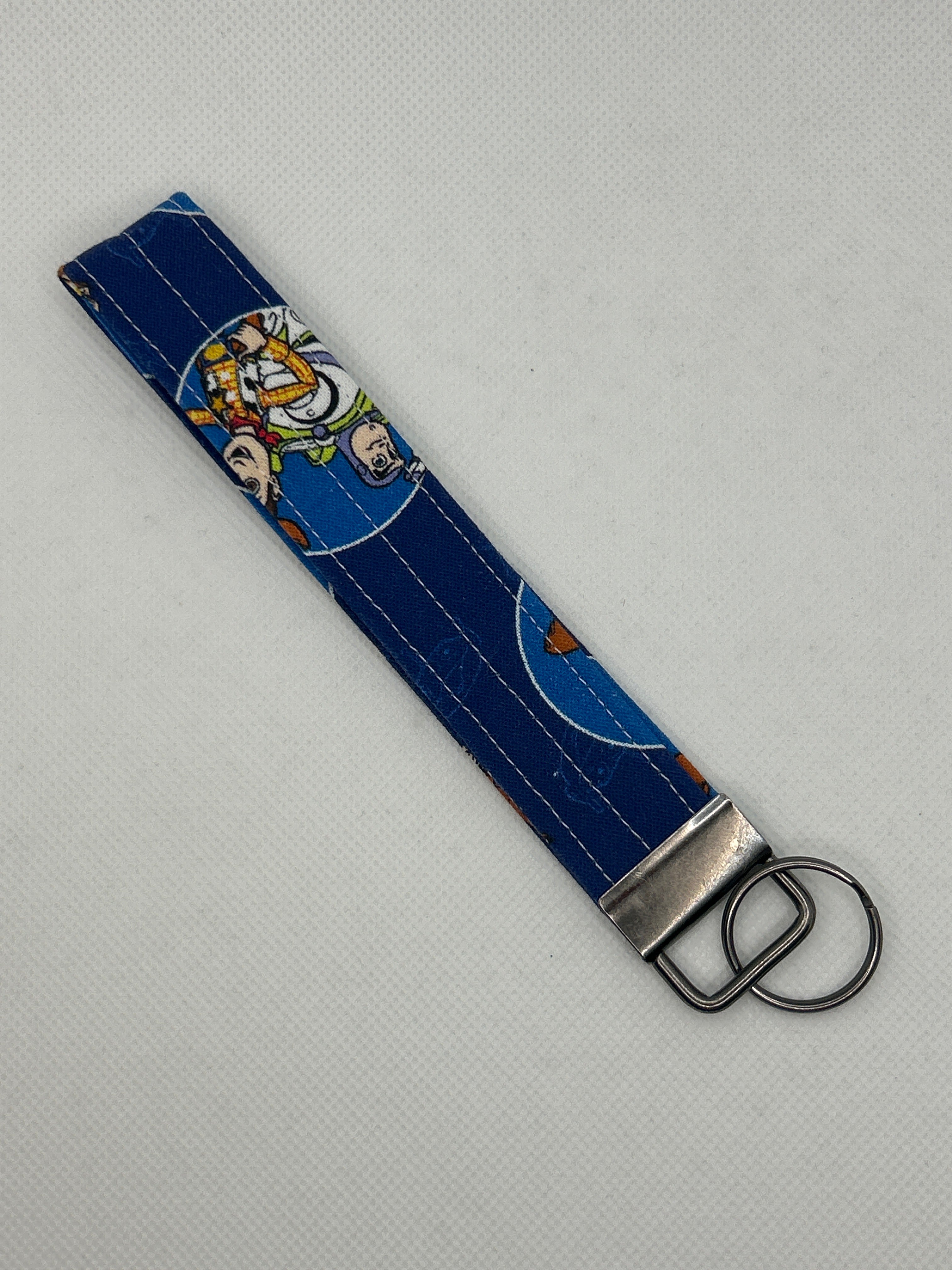 Your Favorite Animated Toy Movie Characters Key Fob Wristlet – Blue