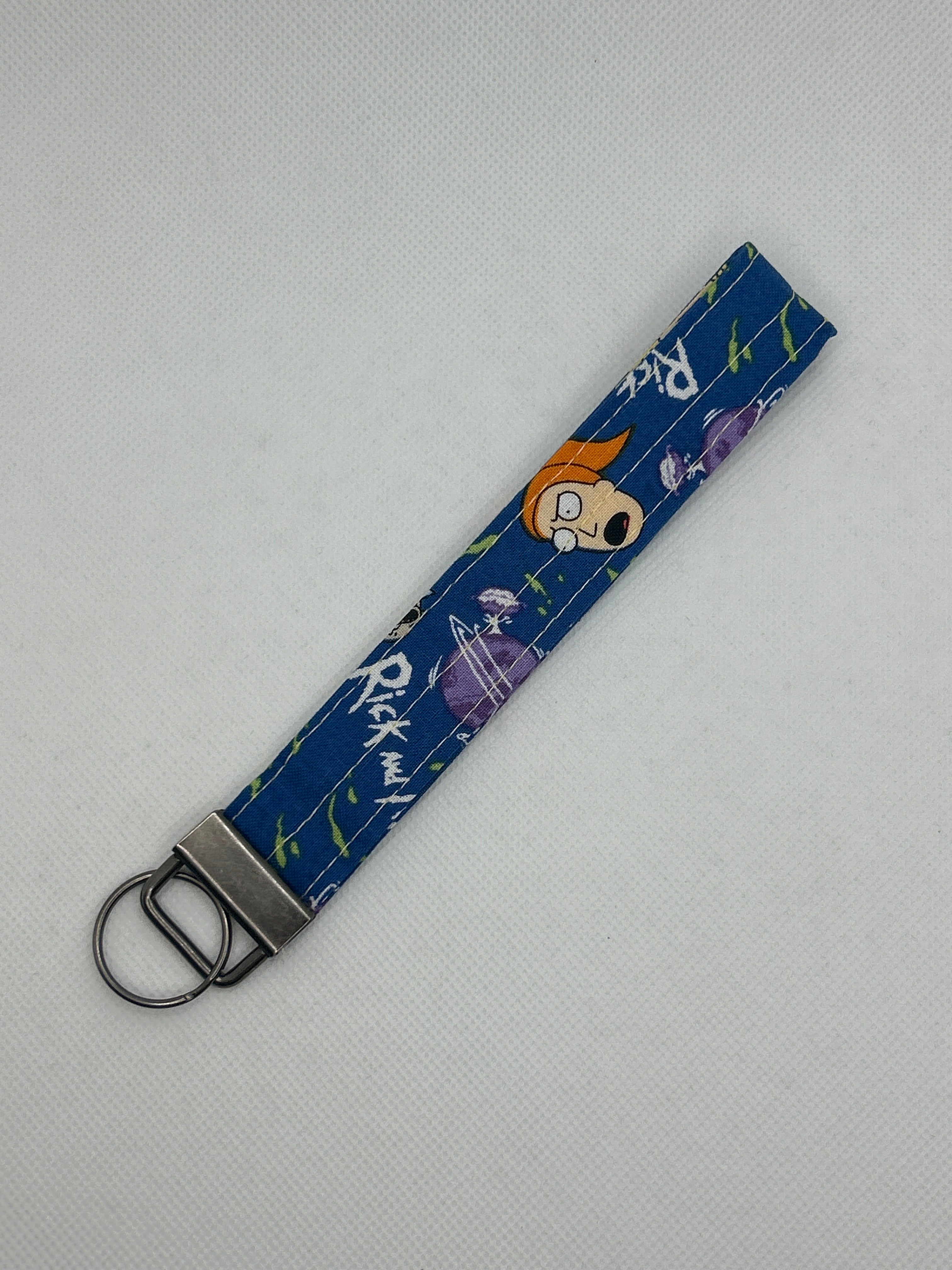 Your Favorite Adult Animated Sci-Fi Show Characters Key Fob Wristlet – Blue