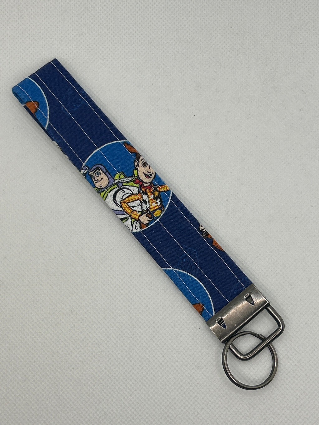 Your Favorite Animated Toy Movie Characters Key Fob Wristlet – Blue