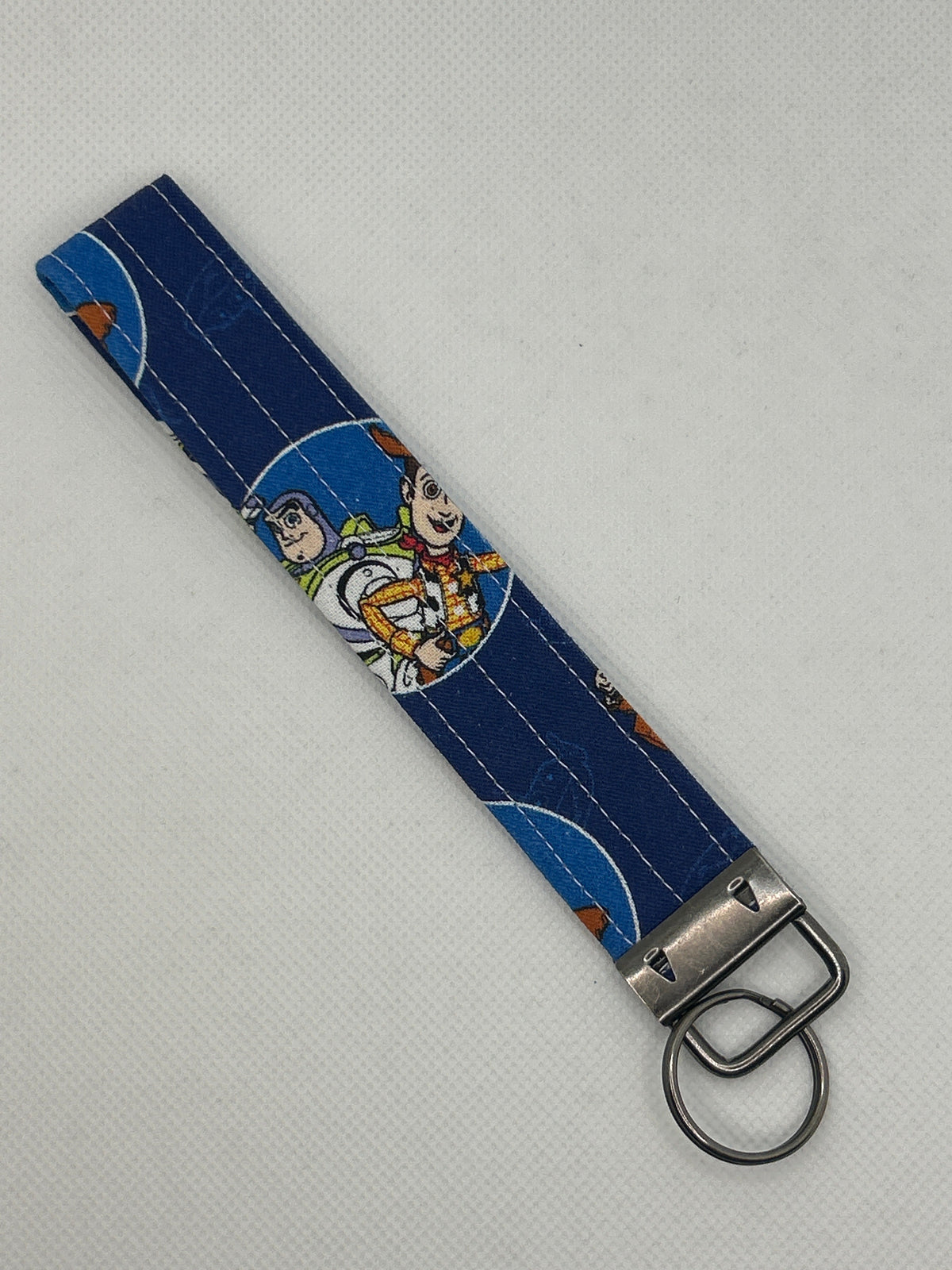 Your Favorite Animated Toy Movie Characters Key Fob Wristlet – Blue